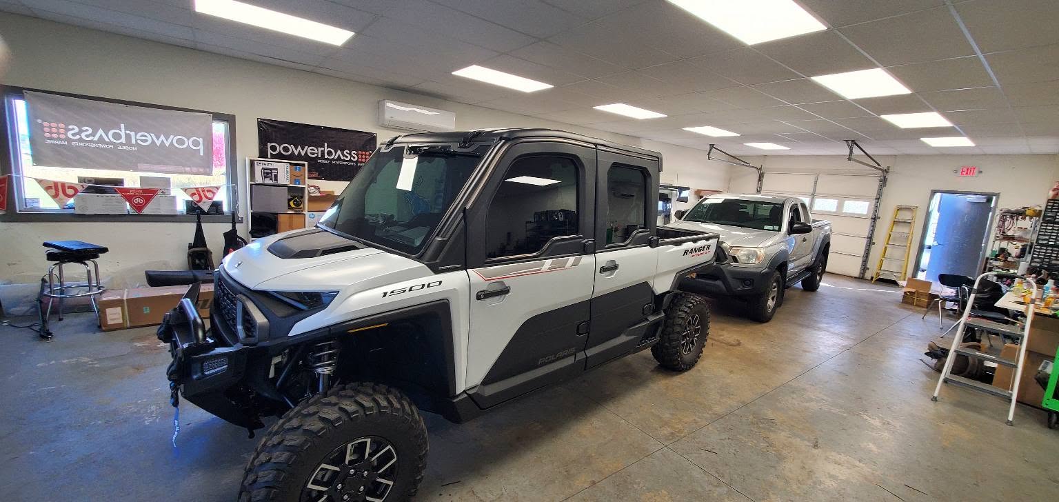 Vehicles inside the P.C. Customs shop